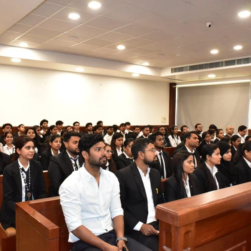 Students seated together in a lecture hall